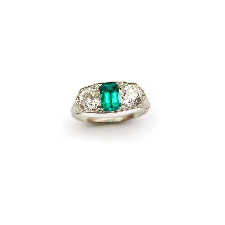 Early 20th century three stone emerald and diamond ring